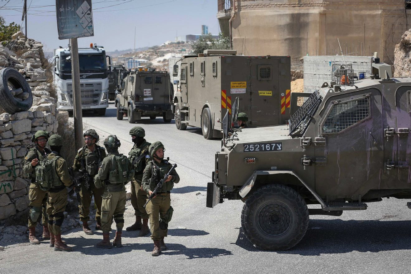 Israeli forces during a search operation in the town of Beit Fajjar, south of Bethlehem near Kibbutz Migdal Oz, where yeshivah student Dvir Sorek, 19, was found dead on Aug. 7, 2019. Photo by Wisam Hashlamoun/Flash90.