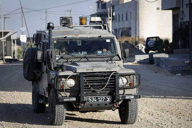 Israeli forces in the West Bank village of Beit Kahil on Aug. 10, 2019. Four Palestinians were arrested after Israeli forces raided the village in search of the killers of Dvir Sorek, 19. who was found stabbed to death two days before in Gush Etzion. Photo by Wisam Hashlamoun/Flash90.