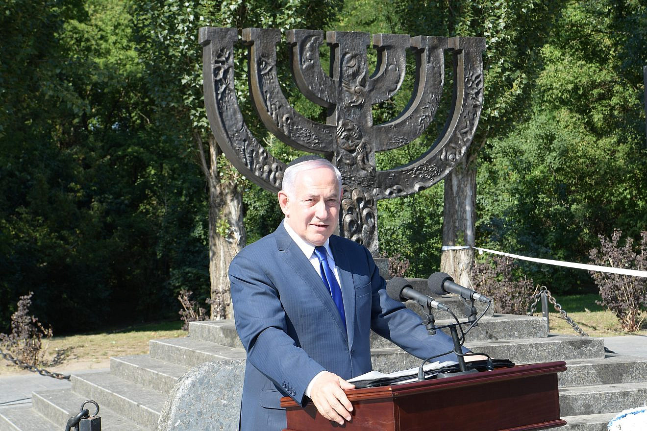 Israeli Prime Minister Benjamin Netanyahu delivers a speech on Aug. 19, 2019 at a ceremony in memory of Ukrainian Jews who were murdered at Babi Yar during World War II. Photo by Amos Ben-Gershom/GPO.