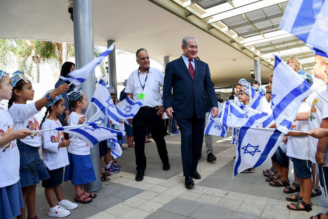 Israeli Prime Minister Benjamin Netanyahu visits Israeli children on the first day of the school year in Yad Binyamin on Sept. 2, 2018. Photo by Avi Ohayon/GPO.