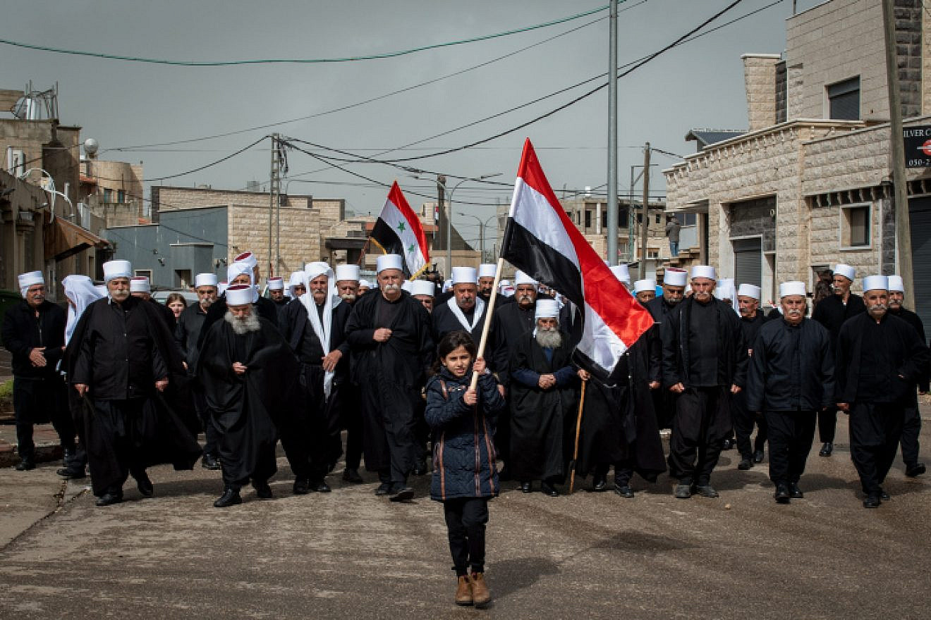 Members of Israel's Druze community protest against U.S. President Donald Trump's recognition of Israeli sovereignty in the Golan Heights, in Buq'ata, in the Golan Heights on March 30, 2019. Photo by Basel Awidat/Flash90.