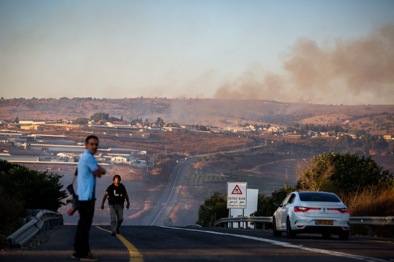 Smoke rises from a fire caused from a rocket fired from Lebanon near Moshav Avivim on the border with Lebanon, in northern Israel, Sept. 1, 2019. Photo by David Cohen/Flash90.