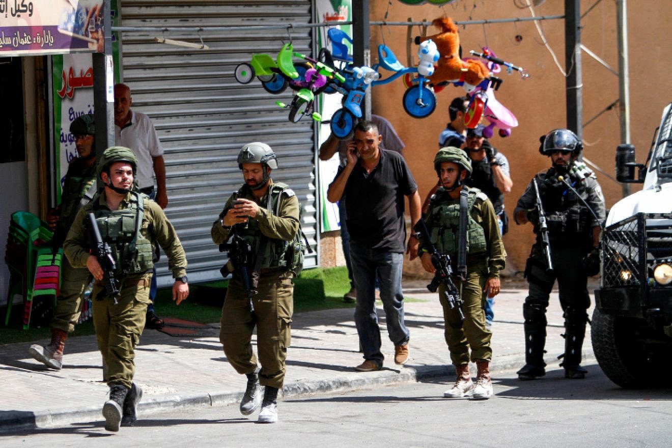 Israeli security forces near the scene of a stabbing attack in the village of Azun, near the city of Qalqilya, on Sept. 7, 2019. Photo by Nasser Ishtayeh/Flash90.