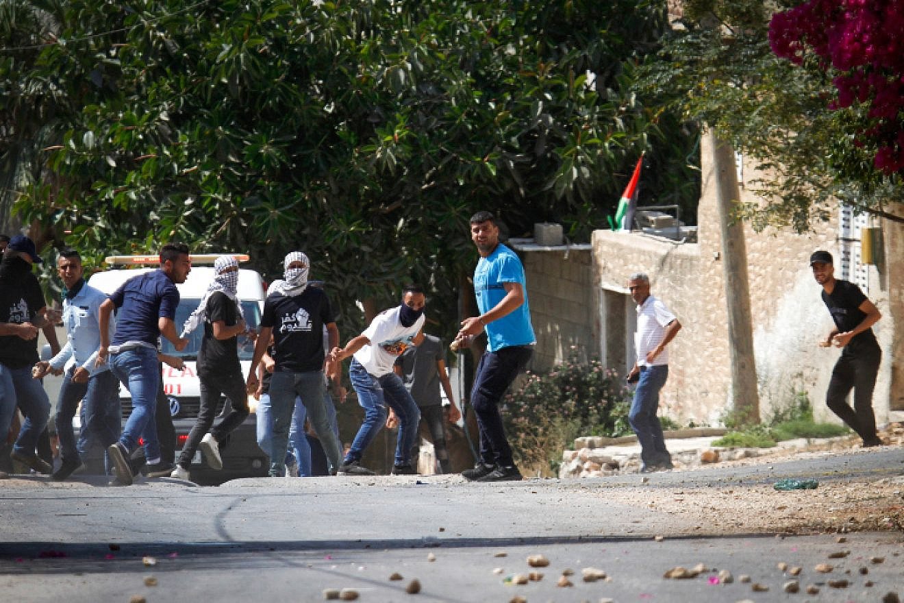 Palestinian demonstrators clash with Israeli forces during a protest in the village of Kfar Qaddum, near the Samaria city of Shechem/Nablus, on Sept. 20, 2019. Photo by Nasser Ishtayeh/Flash90.