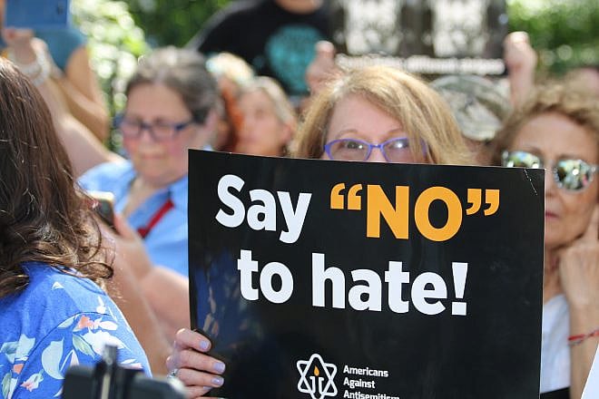 Holding a sign against anti-Semitism at a rally in New York City on Sept. 22, 2019. Photo by Rhonda Hodas Hack.
