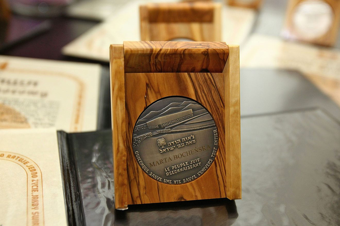The Righteous Among the Nations medal received posthumously by Marta Bocheńska on April 17, 2012, in the Polish Senate. Credit: Michał Józefaciuk via Wikimedia Commons.