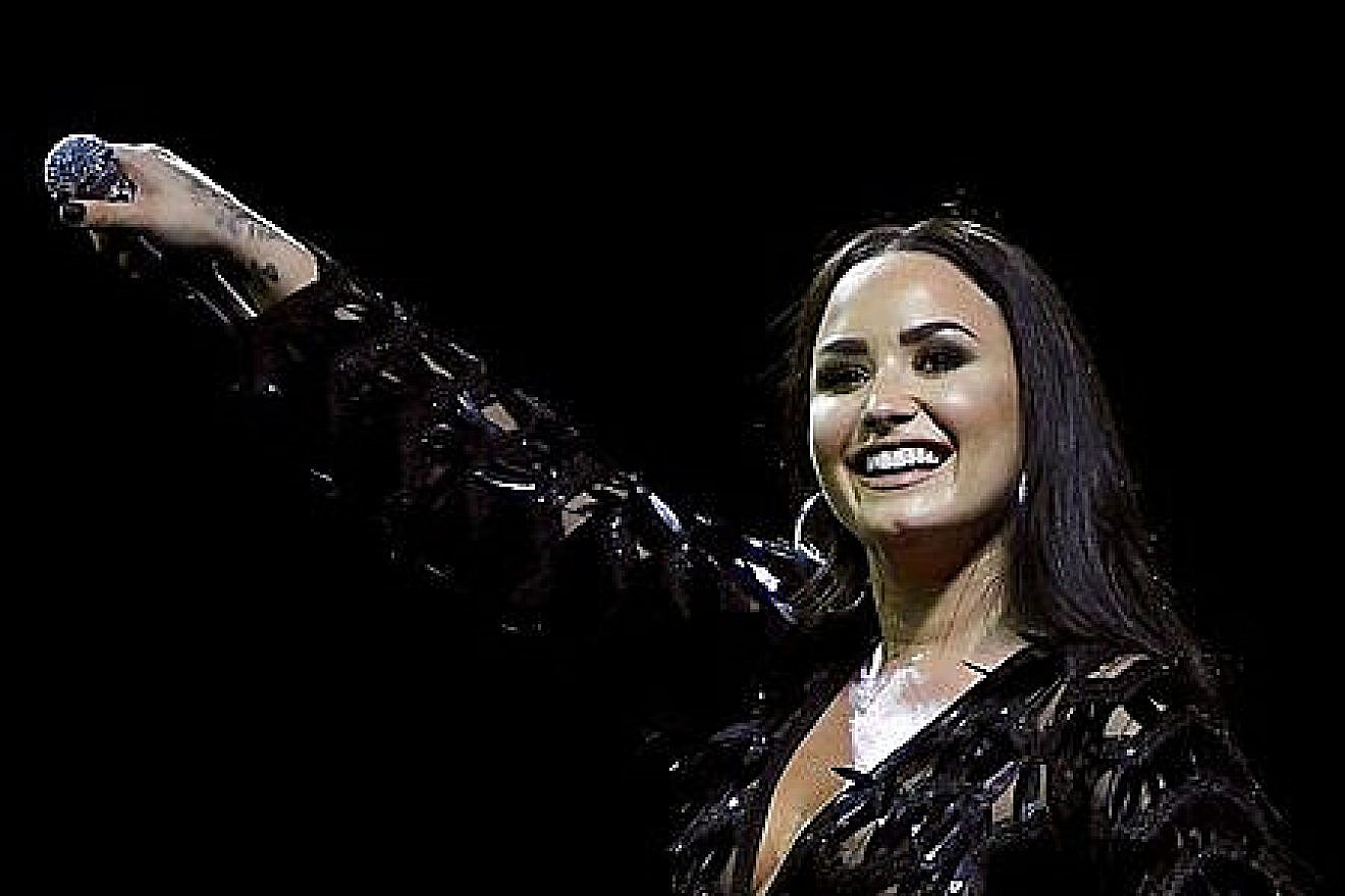 American pop singer Demi Lovato performs in Glasgow, Scotland, during her Tell Me You Love Me world tour, June 13, 2018. Credit: Wikimedia Commons.