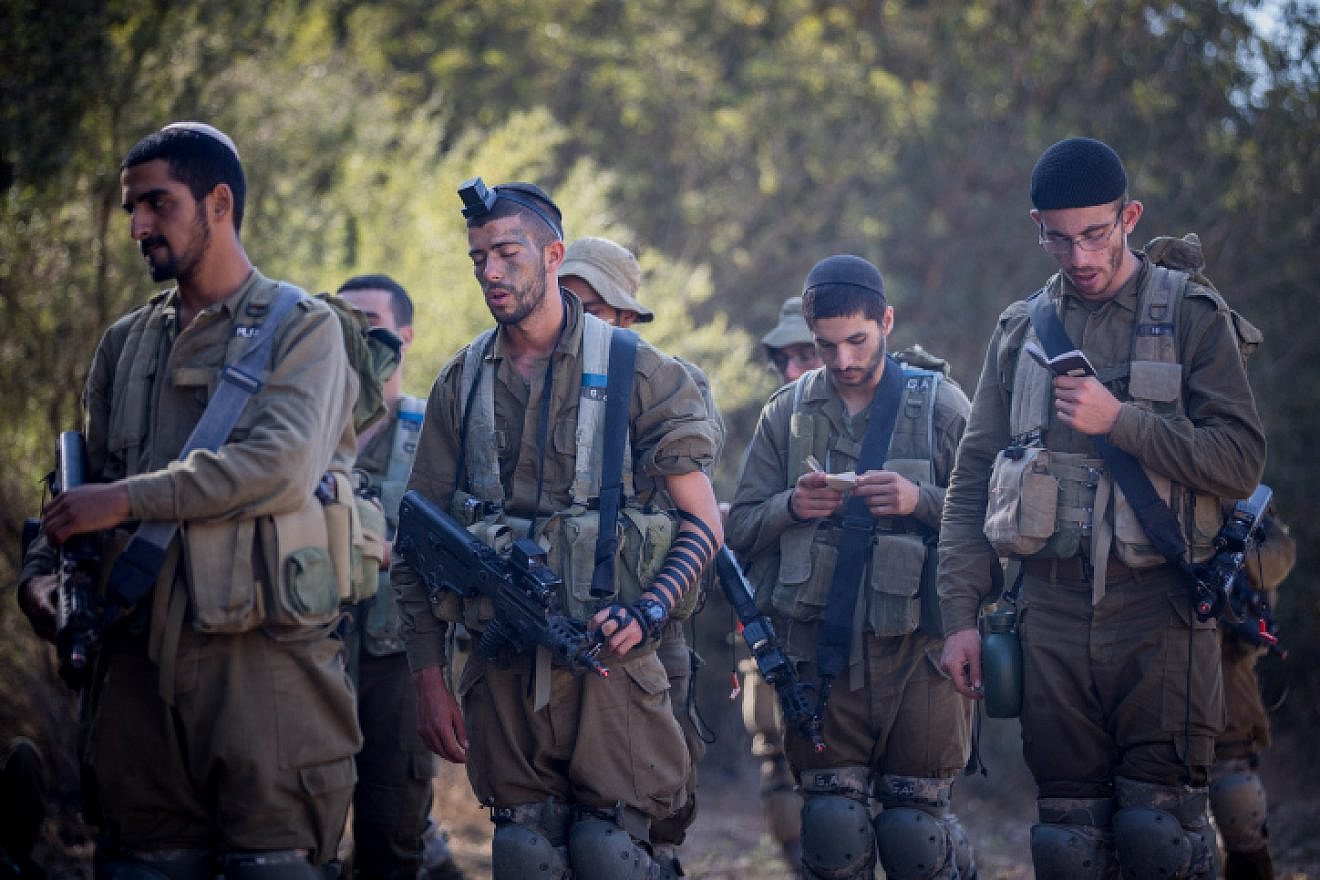 Religious Israeli soldiers pray near the city of Beit Shemesh, Sept. 27, 2017. Photo by Yonatan Sindel/Flash90.