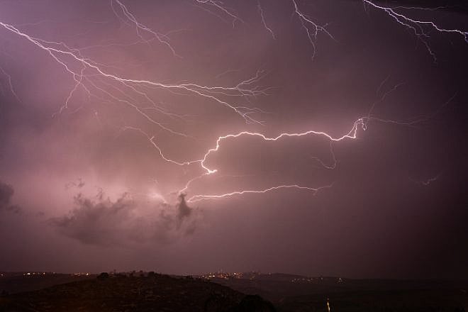 Lightning illuminates the sky over the Samaria Mountains on Nov. 4, 2018. Photo by Hillel Maeir/Flash90.