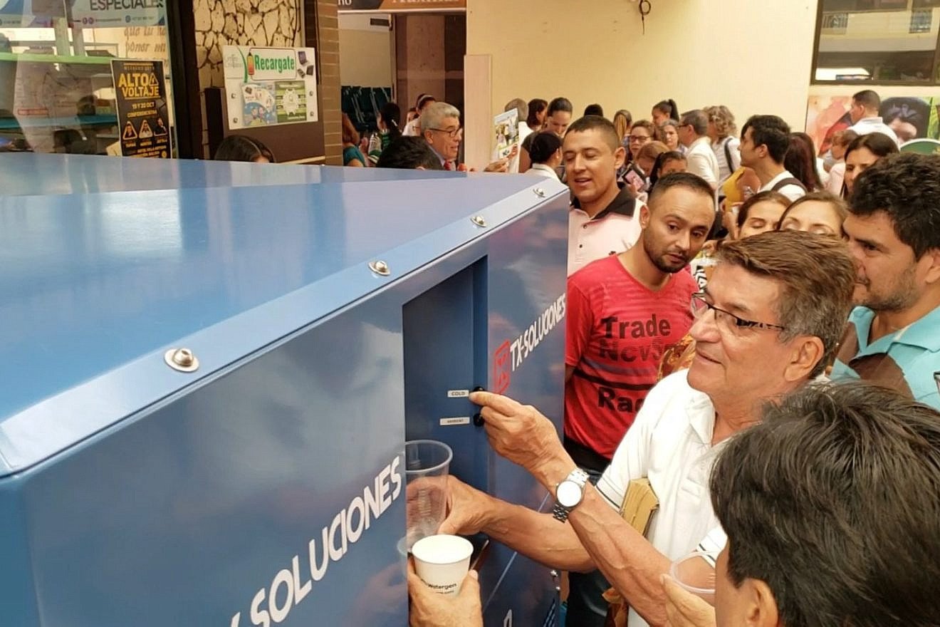 Residents of El Talento, a small town in Colombia adjacent to the city of Cúcuta, have been introduced to the GEN-M, Watergen’s medium-scale atmospheric generator that produces water out of air, October 2019. Credit: Courtesy.