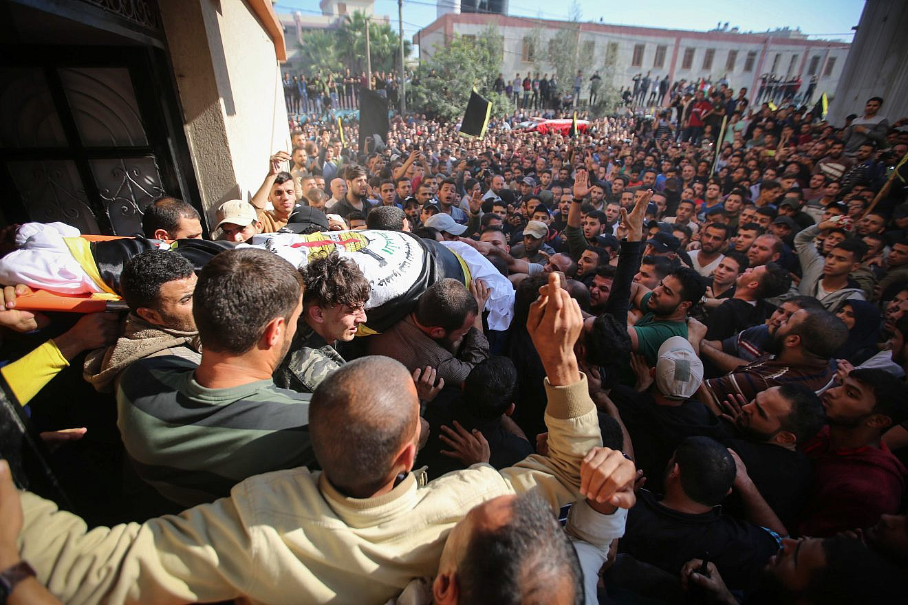 Mourners carry the body of Palestinian Islamic Jihad terrorist field commander Baha Abu al-Ata during his funeral in Gaza City after he was killed by an Israeli airstrike in a targeted attack on Nov. 12, 2019. Photo by Hassan Jedi/Flash90.