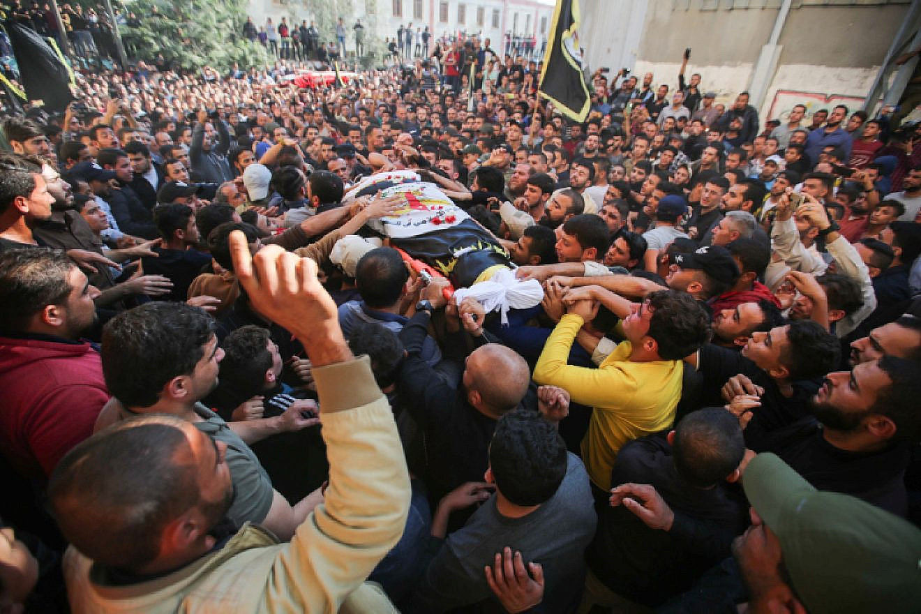 Mourners carry the body of Palestinian Islamic Jihad field commander Baha Abu al-Ata during his funeral in Gaza City after he was killed by an Israeli strike on Nov. 12, 2019. Photo by Hassan Jedi/Flash90.