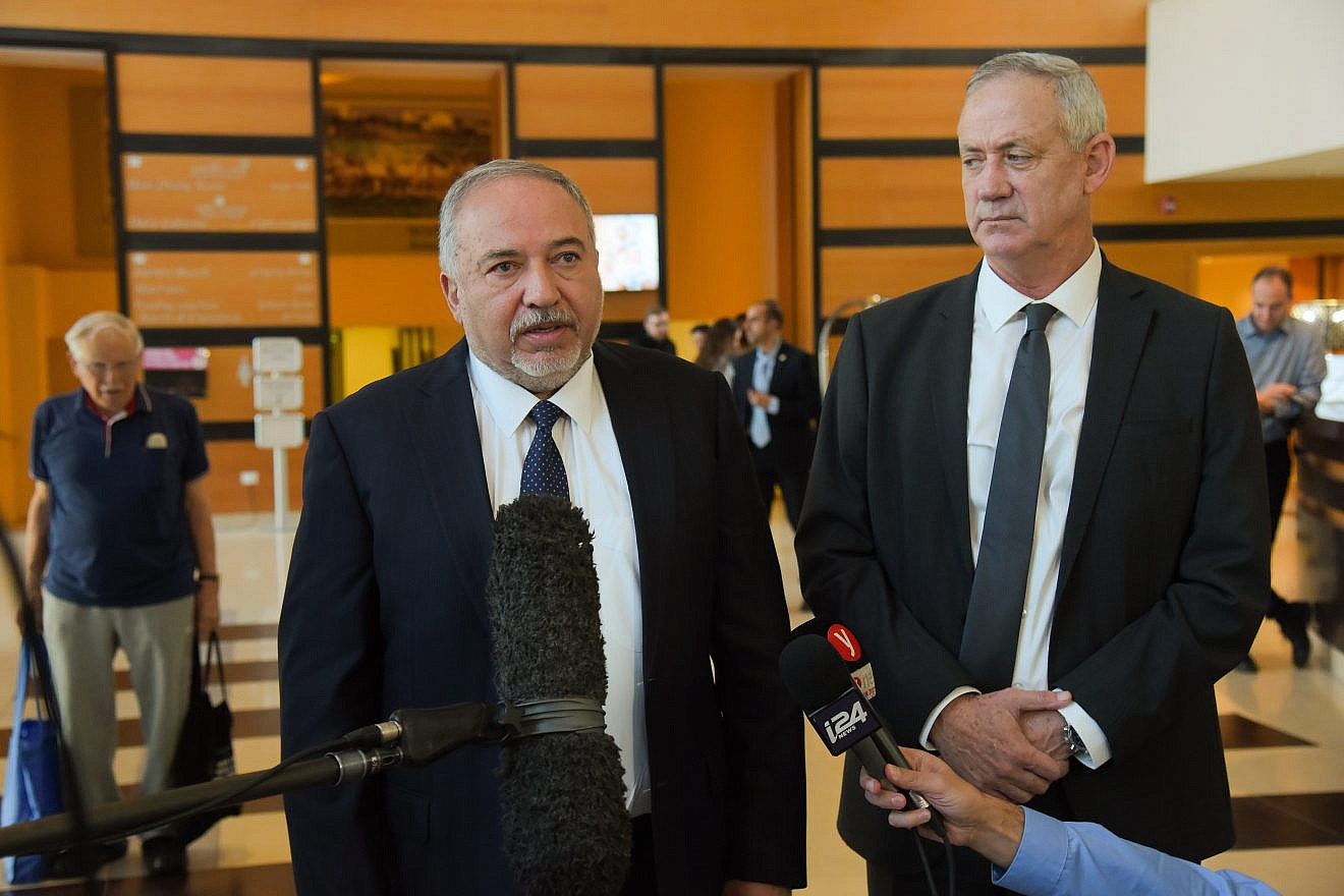 Blue and White Party chairman Benny Gantz and Israel Beitenu Party chairman Avigdor Lieberman give a joint statement to the media after a meeting for negotiations towards building a new government, at the Kfar Maccabiah Hotel in Ramat Gan, on Nov. 14, 2019. Photo by Avshalom Sassoni/Flash90.