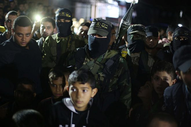 Members of Al-Quds Brigades organize a memorial service for fellow member Khaled Farraj, who was killed during an Israeli air strike during an escalation of fighting between Israel and the Palestinian Islamic Jihad in the Gaza Strip, on Nov. 15, 2019. Photo by Hassan Jedi/Flash90.