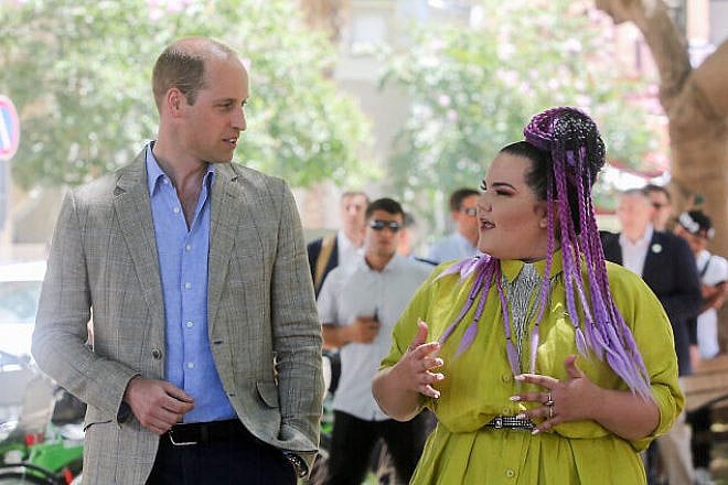 Prince William, Duke of Cambridge walks with Eurovision Song Contest 2018 winner Netta Barzilai on Rothschild Boulevard in Tel Aviv on June 27, 2018. Photo by Marc Israel Sellem/POOL.