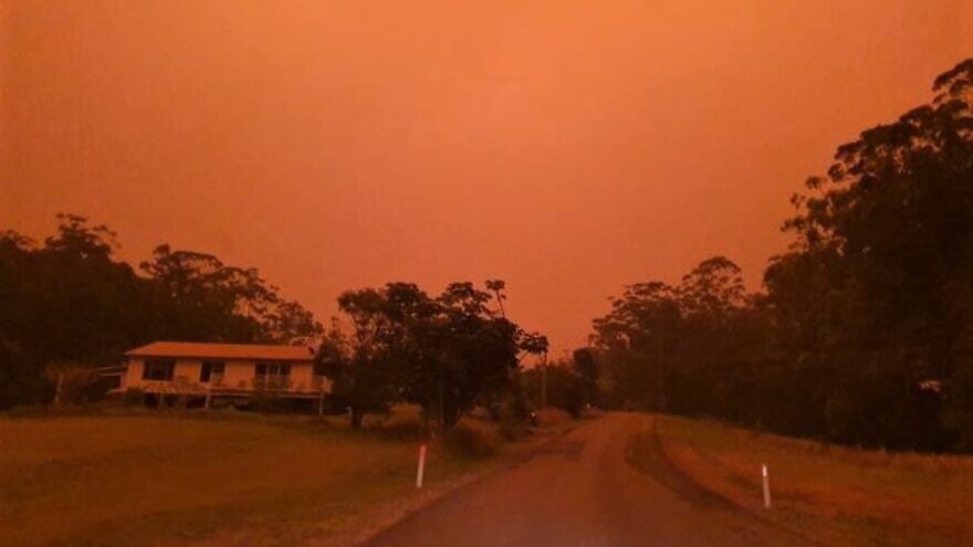 As Shabbat approached, the smoke-filled and bright-orange sky can be seen over Coffs Harbour, a small coastal city in New South Wales, Australia. Credit: Courtesy.