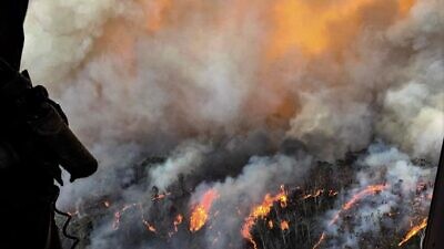 Firefighters have been battling flames throughout Australia more than 130-feet high in some areas. Authorities have called it the country’s worst bushfires in history, with the sheer size of the flames far surpassing that of the 2018 California wildfires and 2019 Amazon fires, January 2020 Credit: CPOA Brett Kennedy/Commonwealth of Australia.