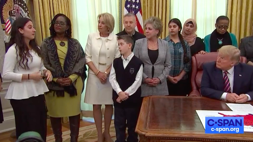 Ariana Hoblin, a Jewish public-school student from Florida, tells U.S. President Donald Trump about being bullied in middle school for her religion. It took place during a ceremony in the Oval Office when Trump signed an executive order to better protect prayer in public schools and federal funds for religious organizations on Jan. 16, 2020. Source: Screenshot.
