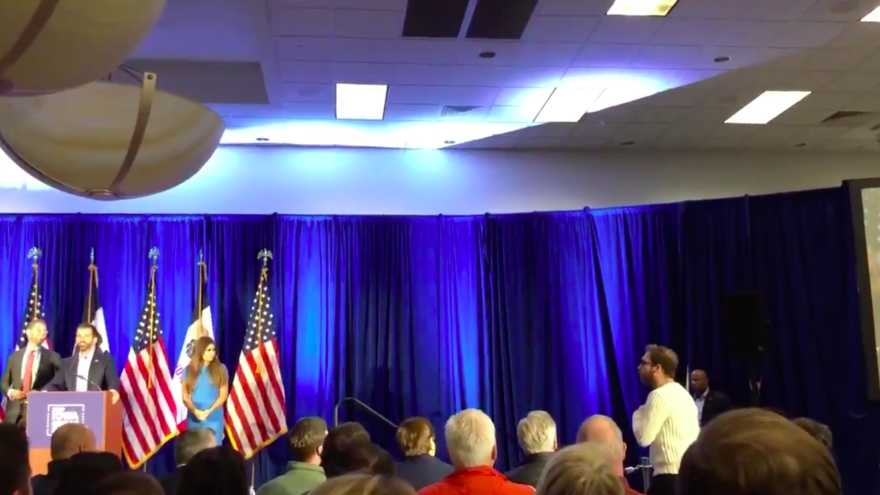IfNotNow organizer Elon Glickman interrupts a press conference conducted by Donald Trump Jr., the son of U.S. President Donald Trump, in West Des Moines, Iowa, ahead of the state’s caucus, on Feb. 3, 2020. Source: Screenshot.