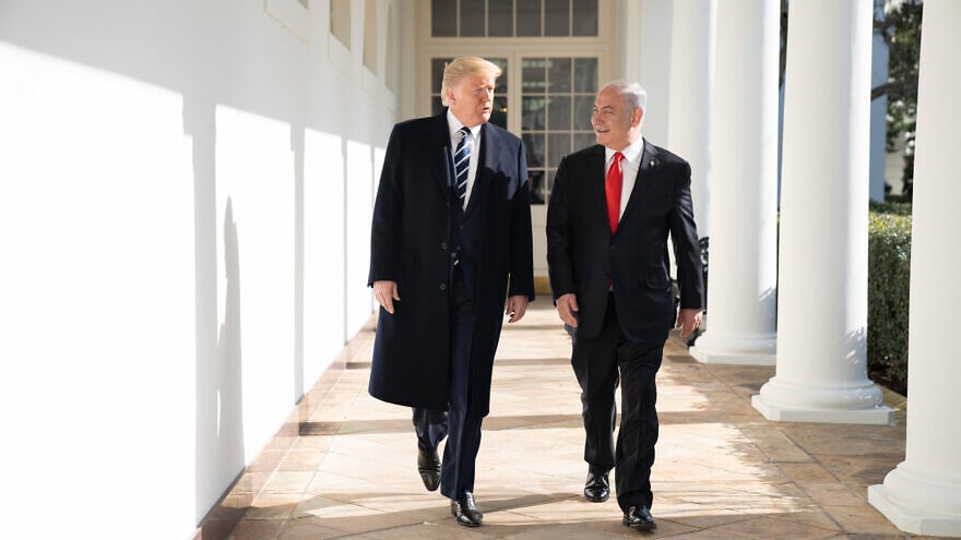U.S. President Donald Trump walks with Israeli Prime Minister Benjamin Netanyahu on Jan. 27, 2020, along the White House colonnade. Credit: Official White House Photo by Shealah Craighead.