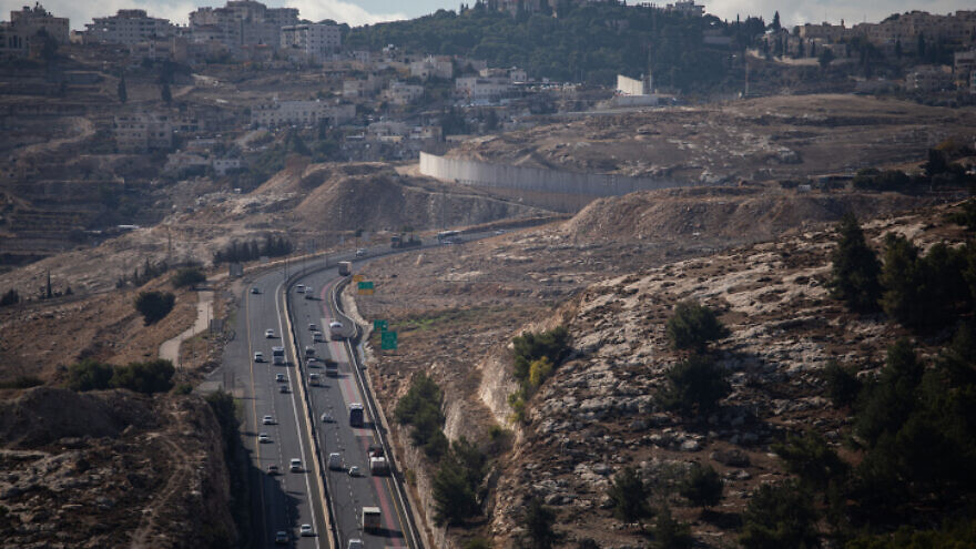 A view of Highway 1, the Ma'aleh Adumim-Jerusalem road, from the West Bank area known as E1, with Jerusalem's Mount Scopus seen on the horizon, Dec. 10, 2019. Photo by Hadas Parush/Flash90.