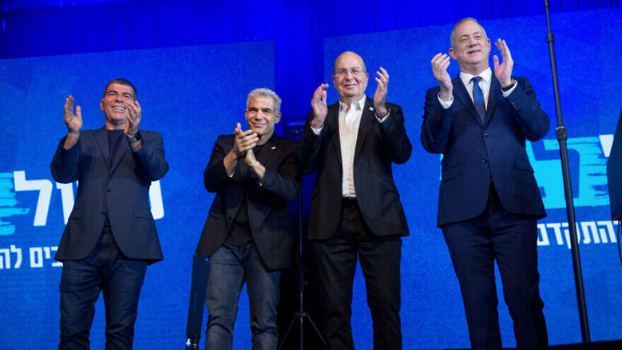 Blue and White Party leader Benny Gantz (far right) with top party members in Tel Aviv on election night after Israel's third round of general elections within a year, March 3, 2020. Photo by Miriam Alster/Flash90.