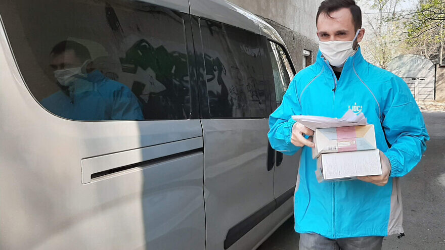 JDC volunteers safely deliver matzah to elderly Jews in locations around the former Soviet Union, including in Chisinau, the capital of Moldova, home to the country's largest Jewish community, April 2020. Credit: Courtesy.