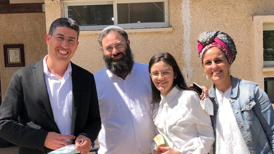 Ruth Cohen and her parents with Shafir Regional Council head Adir Neeman (far left). Credit: Shafir Regional Council.