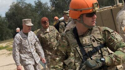 Then-Marine Corps Gen. Joseph F. Dunford Jr., chairman of the Joint Chiefs of Staff, receives a brief about the Multinational Force and Observers defenses during a visit to the North Camp in the Sinai Peninsula of Egypt, Feb. 21, 2016. Photo: D. Myles Cullen/U.S. Department of Defense.