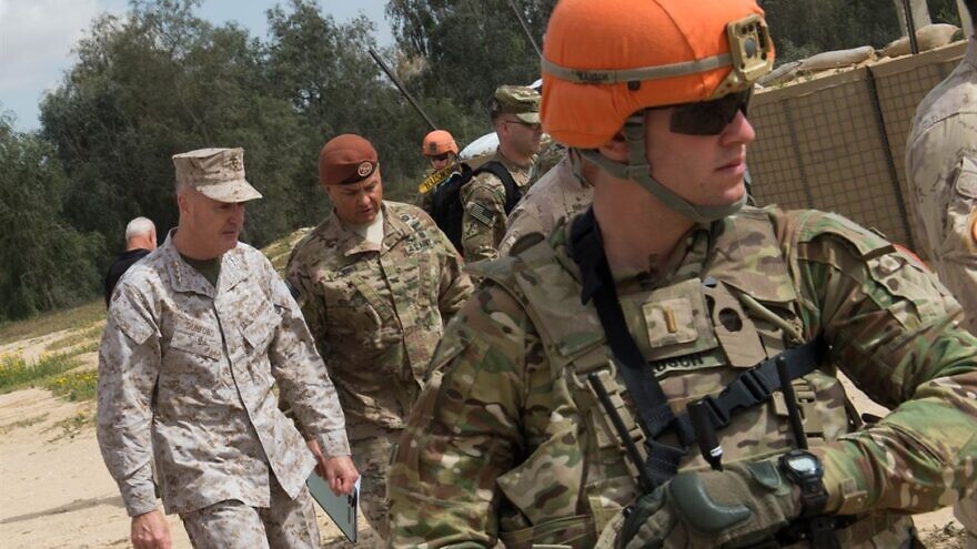 Then-Marine Corps Gen. Joseph F. Dunford Jr., chairman of the Joint Chiefs of Staff, receives a brief about the Multinational Force and Observers defenses during a visit to the North Camp in the Sinai Peninsula of Egypt, Feb. 21, 2016. Photo: D. Myles Cullen/U.S. Department of Defense.