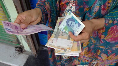 Iran's currency, the rial: The regime's lawmakers approved a measure to switch from it to the toman in a bid to curb inflation. Credit: Adam Jones via Flickr.