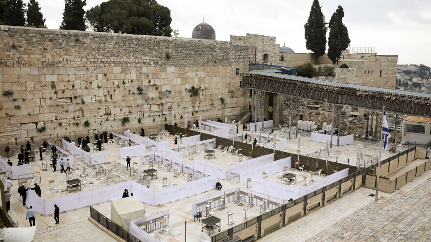 Preparations for the easing of coronavirus restrictions at the Western Wall in Jerusalem's Old City on May 5, 2020. Photo by Olivier Fitoussi/Flash90.