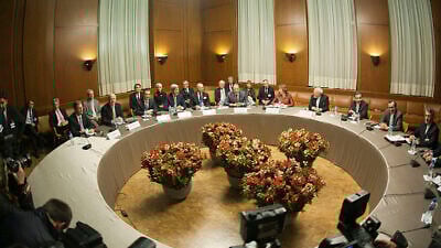 The foreign ministers of Germany, the United Kingdom, China, the United States, France, Russia, the European Union and Iran meet in Geneva on Nov. 24, 2013 for talks on the interim agreement on the Iranian nuclear program. Credit: U.S. Department of State.