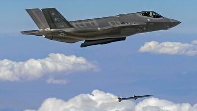 An F-35A Lightning II aircraft from Hill Air Force Base, Utah, fires an AIM 120 missile at the Utah Test and Training Range on Aug. 17, 2017. Credit: U.S. Department of Defense/Scott Wolff.