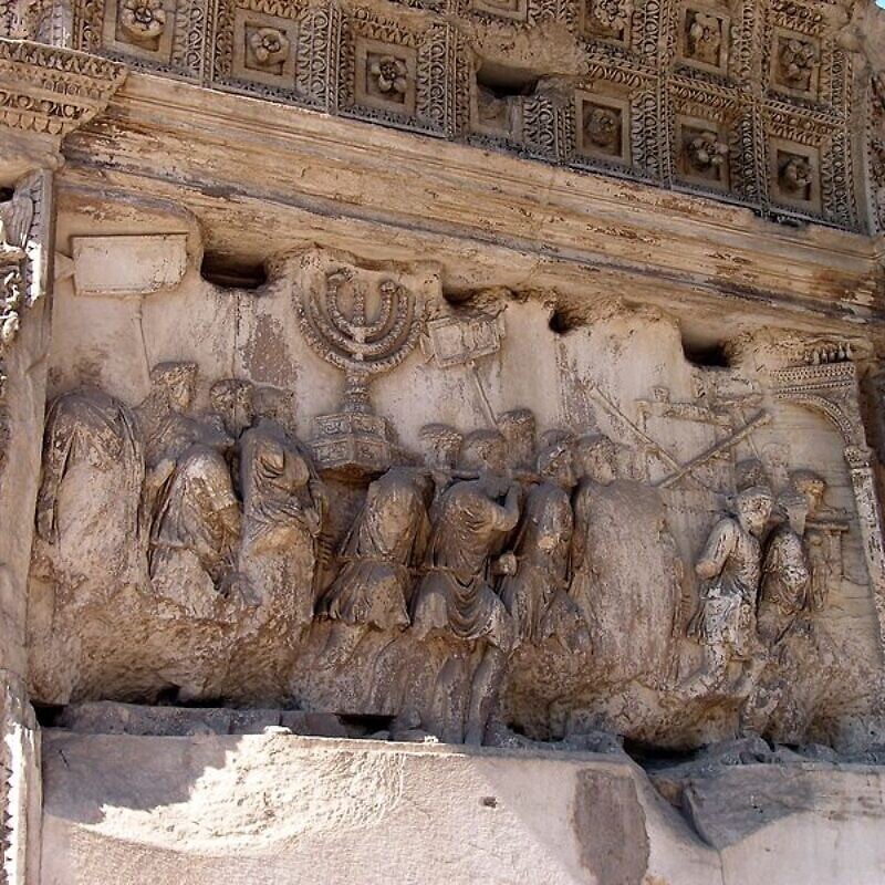 The south inner panel of the Arch of Titus in Rome, a close-up relief showing spoils from the fall of Jerusalem. Credit: Dnalor 01 via Wikimedia Commons.
