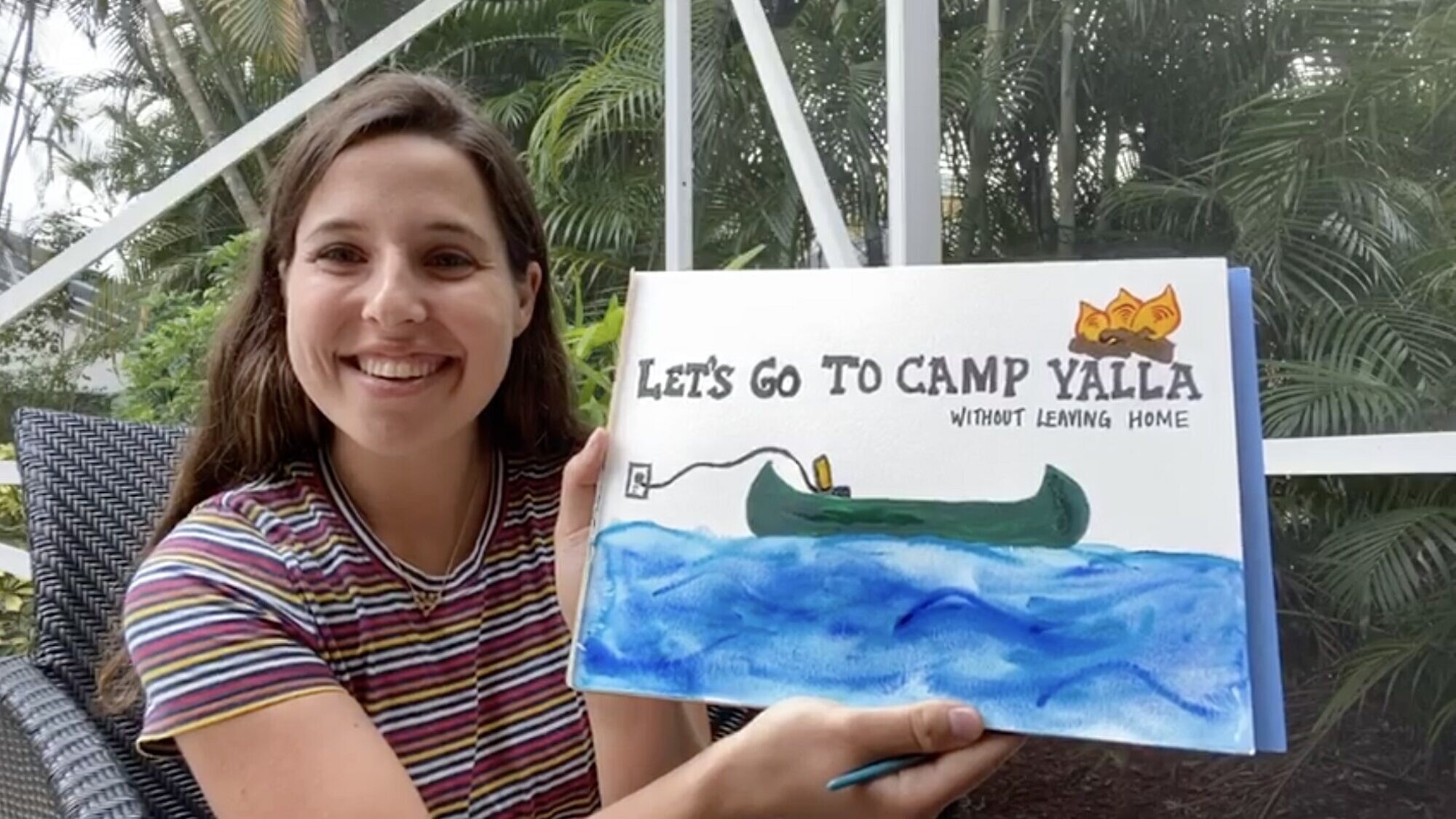Mariel Falk, co-founder and co-director, showing off her painting skills and Camp Yalla enthusiasm. Source: Screenshot.