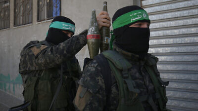 Palestinian fighters in the Izz ad-Din al-Qassam Brigades, the armed wing of the Hamas movement, during a patrol in Khan Younis in the southern Gaza Strip on Jan. 26, 2020. Photo by Abed Rahim Khatib/Flash90.