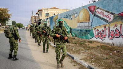 Palestinian fighters in the Izz ad-Din al-Qassam Brigades, the armed wing of Hamas, during a patrol in Rafah in the southern Gaza Strip on April 27, 2020. Photo by Abed Rahim Khatib/Flash90.