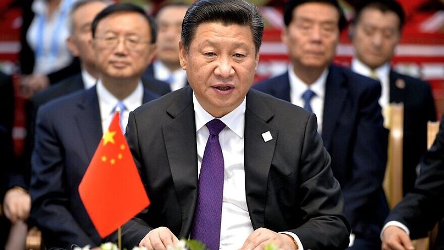 Chinese President Xi Jinping meets with Russian President Vladimir Putin and President of Mongolia Tsakhiagiin Elbegdorj at the 2015 BRICS summit in Ufa, Russia, on July 9, 2015. Credit: Russian Presidential Press Office via Wikimedia Commons.