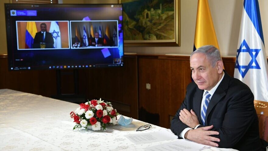 Israeli Prime Minister Benjamin Netanyahu holds a video conference with Colombian President Ivan Duque to finalize a free-trade agreement, on Aug. 10, 2020. Source: Facebook/Benjamin Netanyahu.