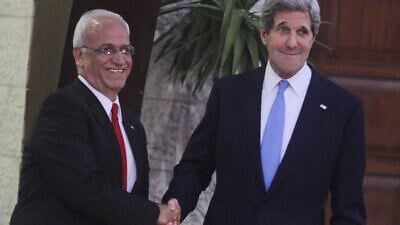 Former U.S. Secretary of State John Kerry with chief Palestinian negotiator Saeb Erekat prior to Kerry meeting with Palestinian Authority leader Mahmoud Abbas in Ramallah, April 7, 2013. Photo by Issam Rimawi/Flash90.