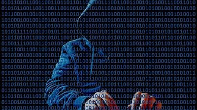 Illustrative image of a computer hacker. Credit: David Whelan via Wikimedia Commons.