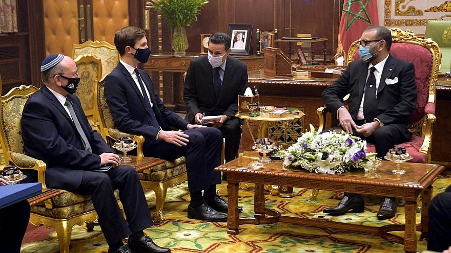 Then-Israeli National Security Adviser Meir Ben-Shabbat (left) and senior adviser to the U.S. president Jared Kushner (second from left) with Moroccan King Mohammed VI (right) at the royal palace in Rabat, Dec. 22, 2020. Credit: Amos Ben-Gershom/GPO.