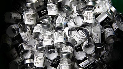 Empty doses of COVID-19 vaccine at a vaccination center in Jerusalem, on Jan. 28, 2020. Photo by Olivier Fitoussi/Flash90.