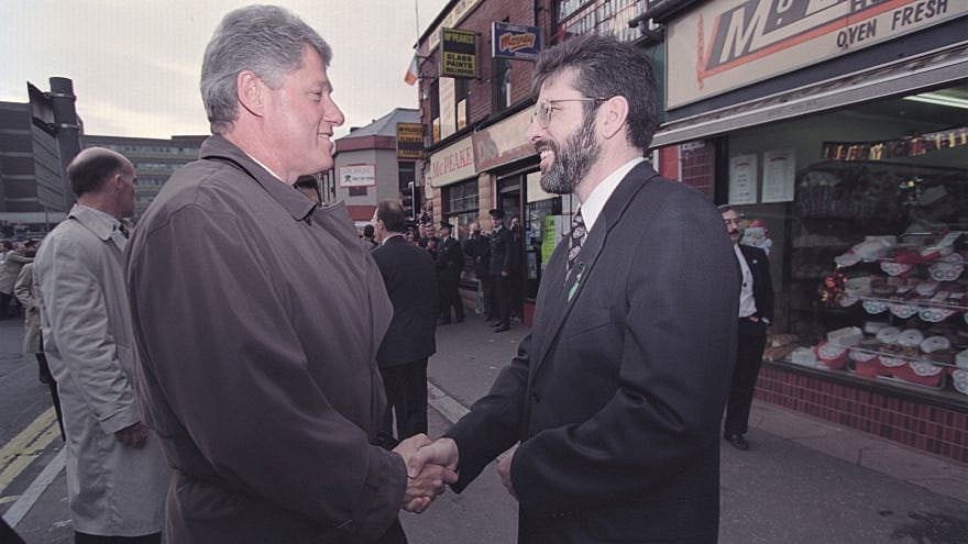 Former President Bill Clinton greets Gerry Adams in East Belfast, Nov. 30, 1995. Credit: White House Photo by Sharon Farmer via Wikimedia Commons.
