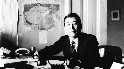 Japanese diplomat Chiune Sugihara at his desk in Vilnius, Lithuania. Credit: Wikimedia Commons.