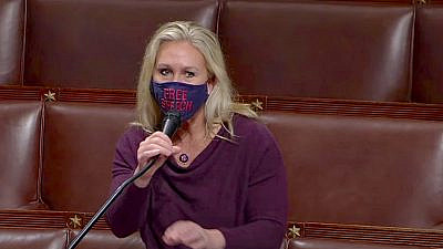 Rep. Marjorie Taylor Greene (R-Ga.) speaking to the House of Representatives ahead of a vote on whether or not to remove her from House committees. Source: Screenshot/C-SPAN.