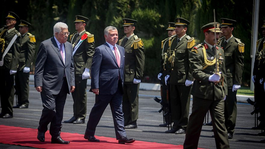 Palestinian Authority leader Mahmoud Abbas and Jordanian King Abdullah II review an honor guard in Ramallah, Aug. 7, 2017. Credit: Flash90.