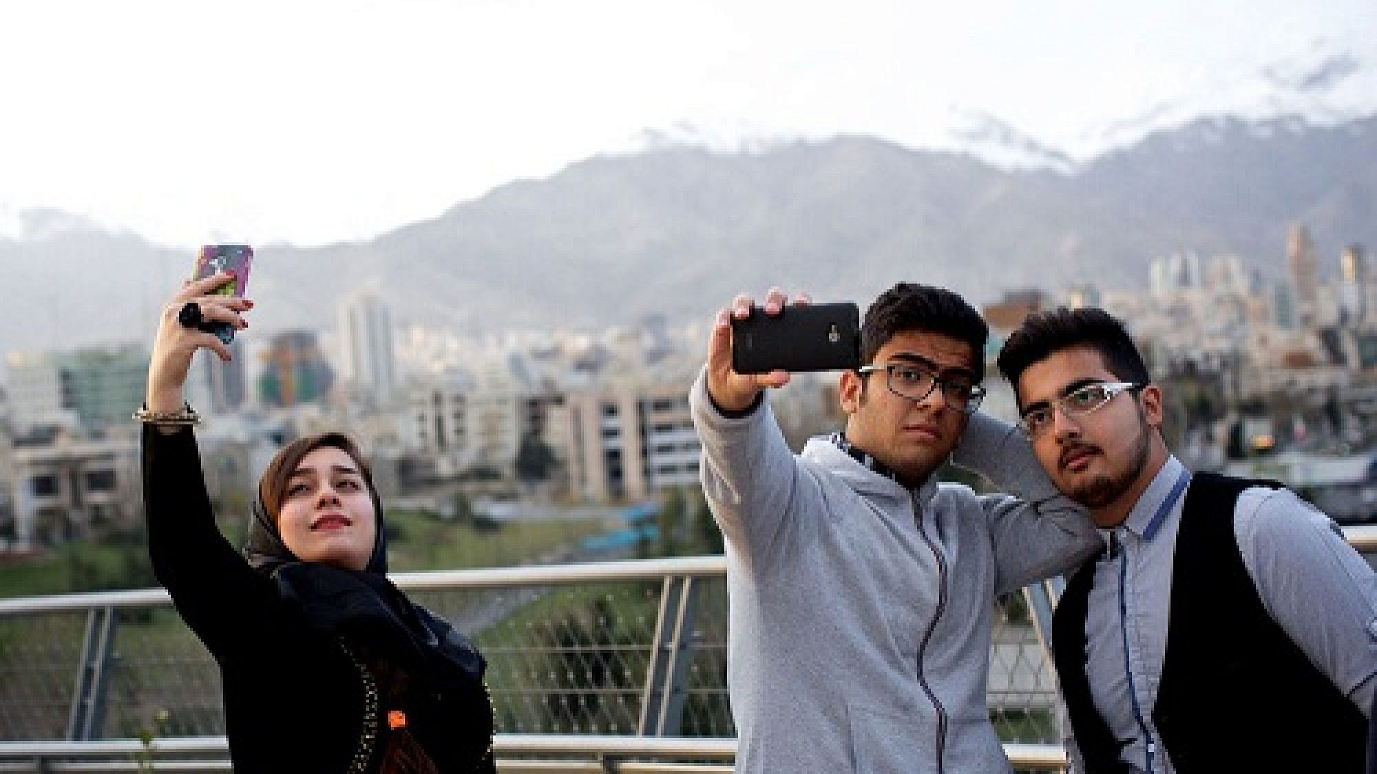 Iranian youth taking selfies on Aug. 12, 2020. Credit: Faranak Bakhtiari via Wikimedia Commons.
