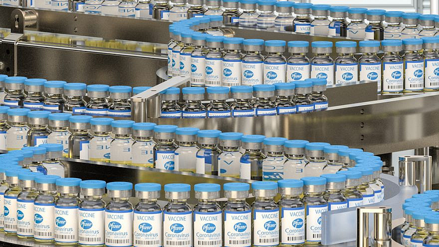 Pfizer's COVID-19 vaccine seen on the production line. Credit: Mike Mareen/Shutterstock.